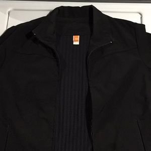 Black Poly/spandex zip jacket.